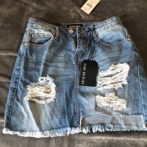 Fashion Nova distressed denim skirt